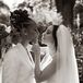 LGBTQIA+ Couple Smiling and Embracing