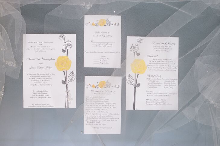 Britni designed the wedding stationery herself. She used a pretty yellow rose motif to decorate the borders of the paper goods.