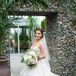 “I was open-minded when it came to my dress,” Katina says. She tried on several styles at different salons, instantly falling in love with a Martina Liana two-piece gown with a sweetheart neckline and a ruched corset tulle skirt.