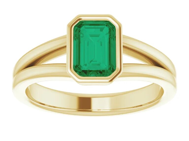 Gold and emerald engagement ring by Gage Diamonds. 