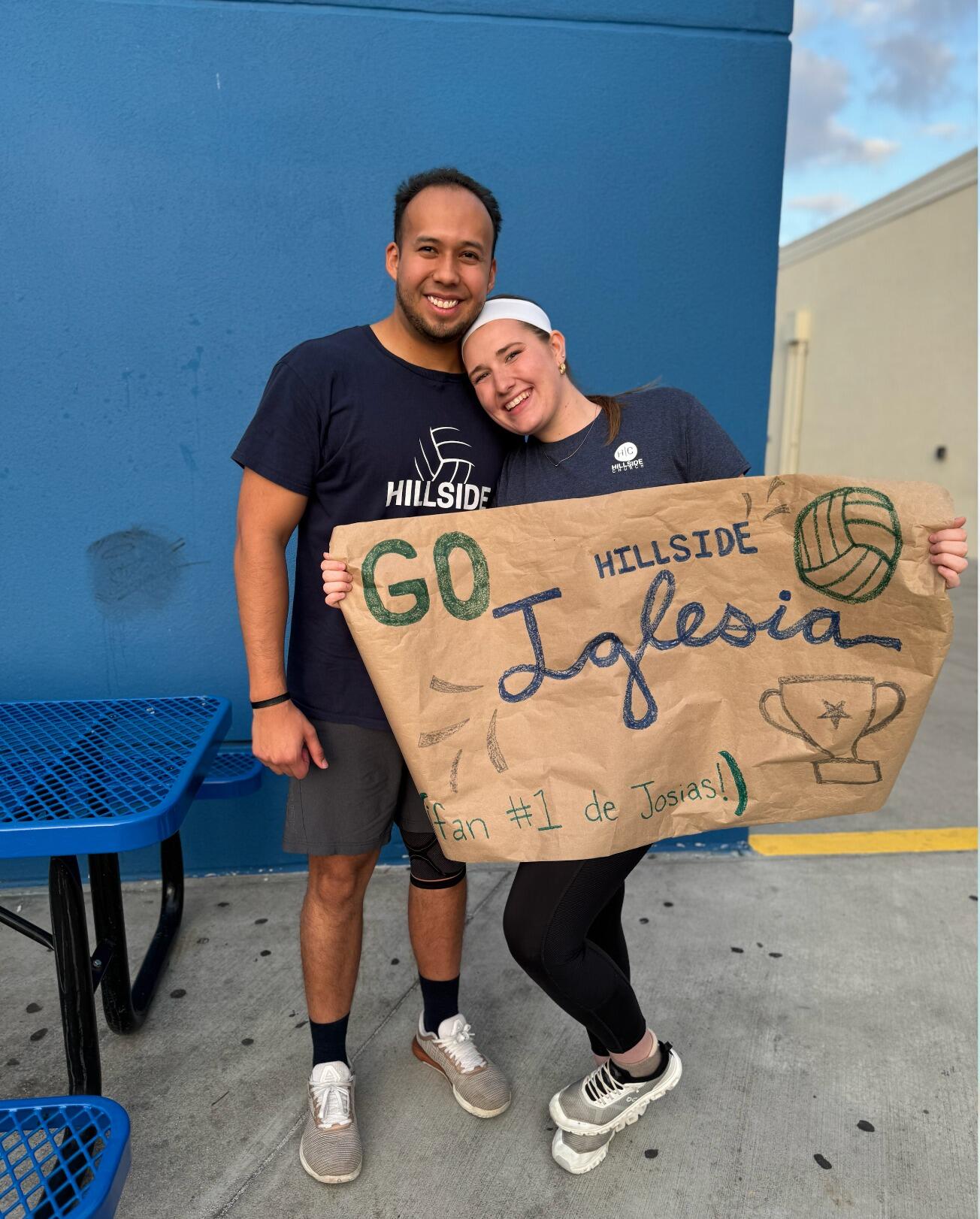 Avery cheering on Josias and his church volleyball team! 