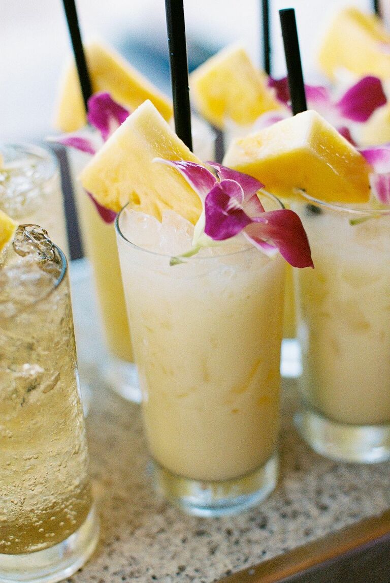 Pina coladas with orchid garnishes