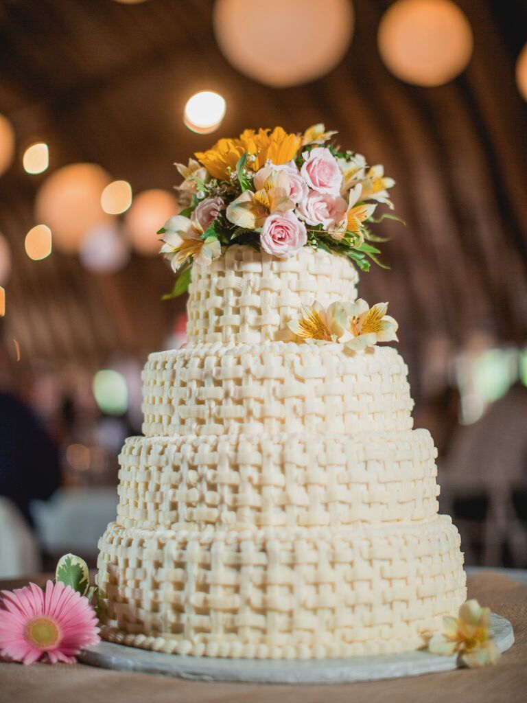 basket weave wedding cake decoration with flowers