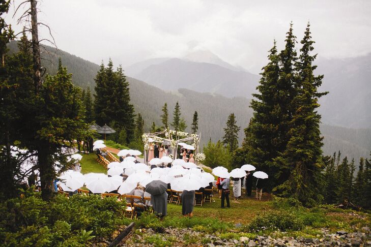 The couple was not deterred by the sudden rainstorm--they still held their ceremony outside.