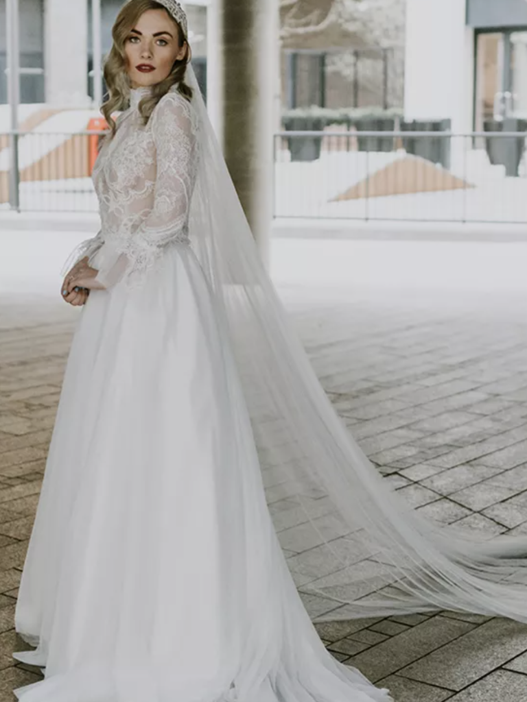 high neck lace top ball gown with long sleeves