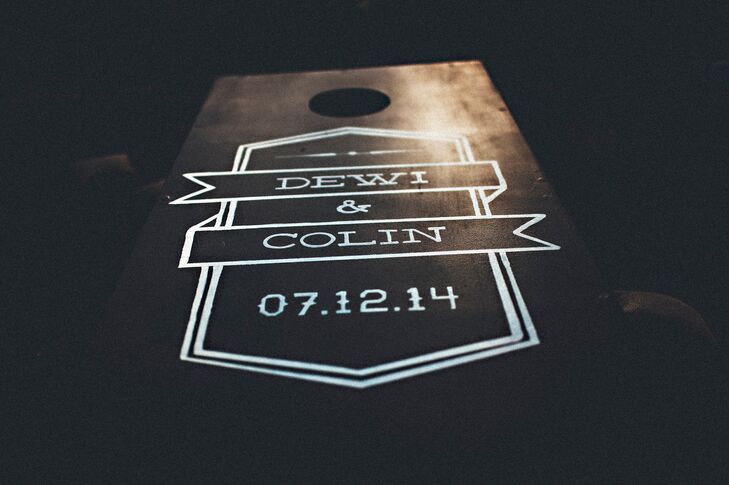 The couple painted the custom-designed black and white bean bag toss for guests to play at the reception.