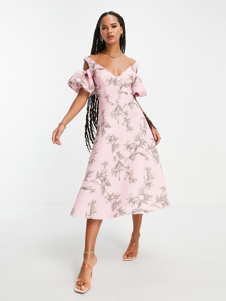 ASOS Design floral print midi wedding guest dress in light pink with corset bodice and puffed sleeves