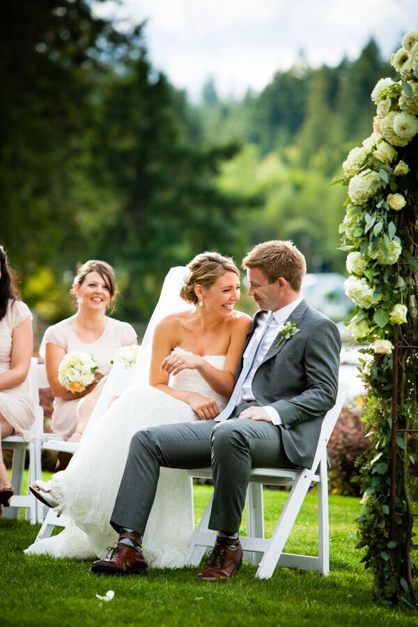 Michelle and Jeff shared a moment in the middle of the ceremony, where they sat next to each other and smiled. Jeff sported a light gray suit, paired with a light gray tie that all the groomsmen matched.