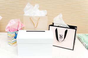 Bridal Shower Gift Table With Presents, Including a Victoria's Secret Bag
