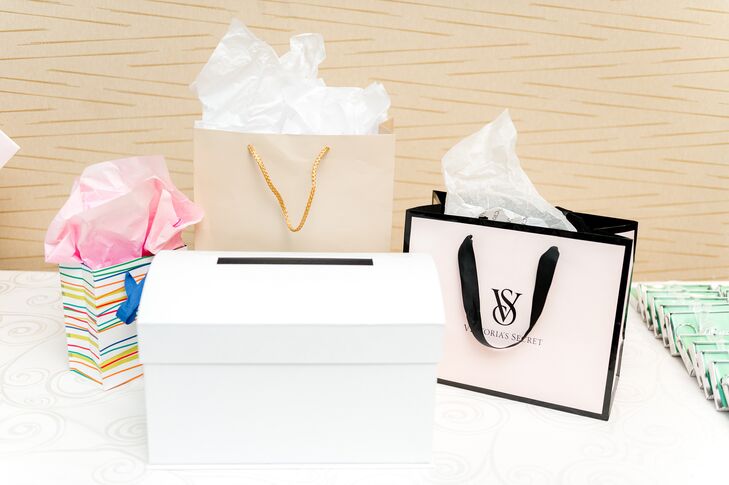 Bridal Shower Gift Table With Presents, Including a Victoria's Secret Bag