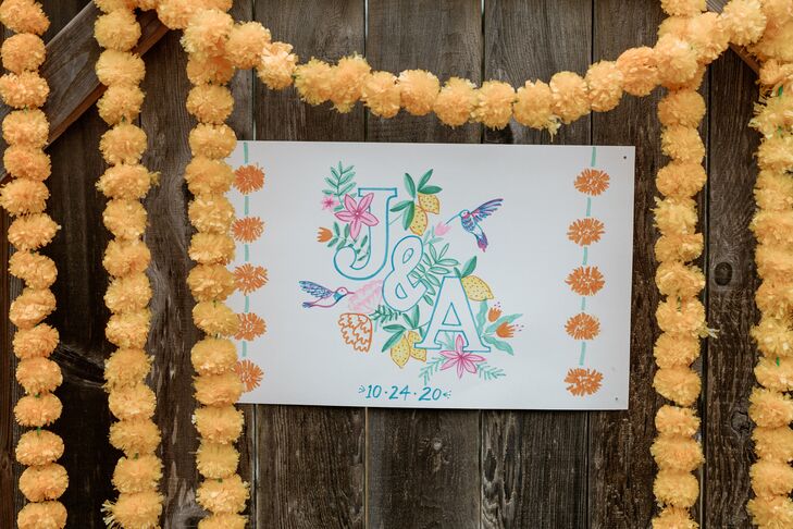 Monogram Sign Surrounded by Marigolds