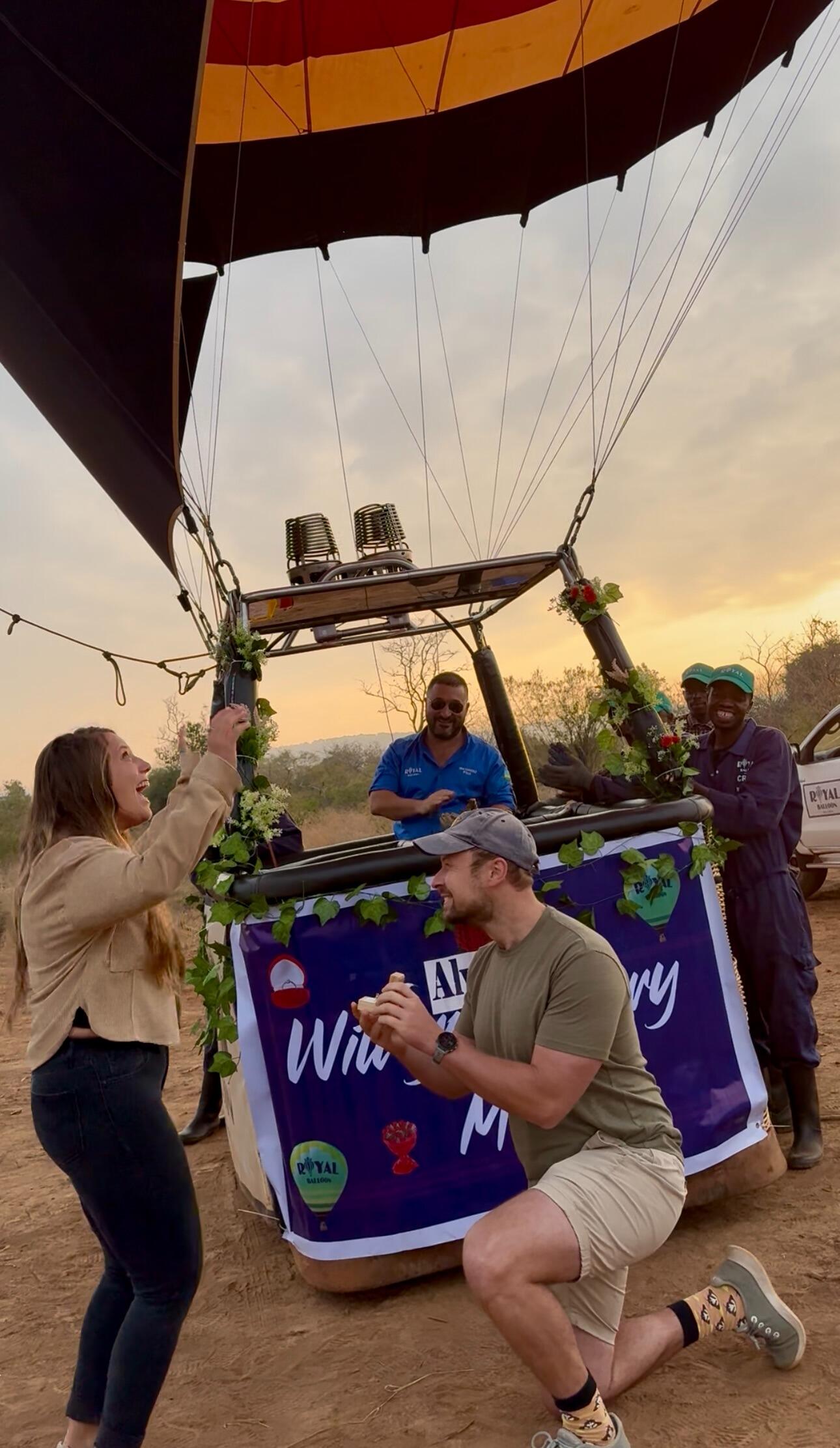 The REAL proposal — Akagera National Park.
Chris finally proposed one early morning in our favorite safari park by "surprising" Aly with a hot air balloon ride. This one was real. We promise.