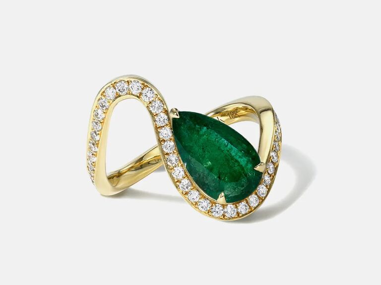 unique emerald pear engagement ring on curvy 18-karat yellow gold band