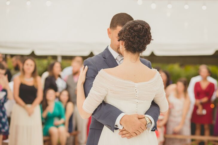 With some help from Hair by Stephanie, Roxy's hairstyle fit the classic wedding day look to a T. She wore her an elegant updo with tons of tight curls and a chic side bang.