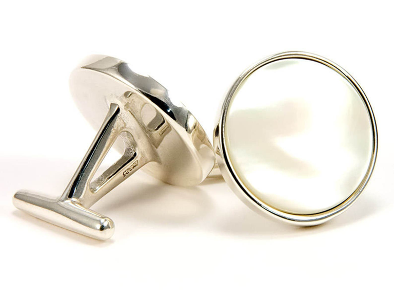 Round mother of pearl cuff links set in sterling silver