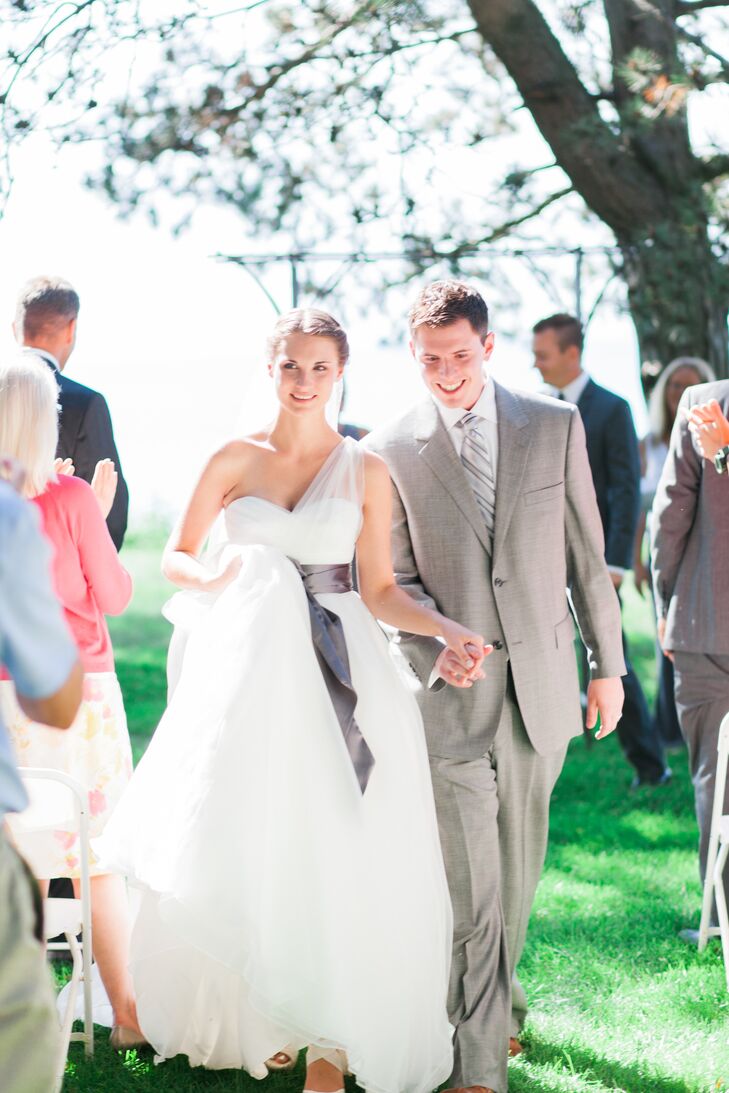 Eddie wore a light gray suit with a striped tie for a casual look that matched the gray sash on Madison's dress. He decided to forgo a boutonniere to keep his look simple and clean.