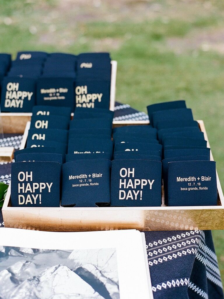 navy blue wedding koozie favors customized with "oh happy day!" 