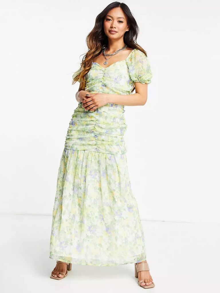 asos mint green pastel dress for wedding guests with yellow and blue floral print sweetheart neckline pleated skirt puffy short sleeves and ruching