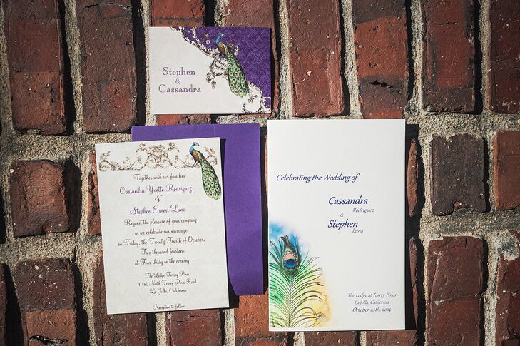 Going along with the theme, ivory invitations accented with peacock designs gave guests a glimpse into the wedding. Peacock graphics accented the pages, in addition to vibrant feather designs on the ceremony programs.