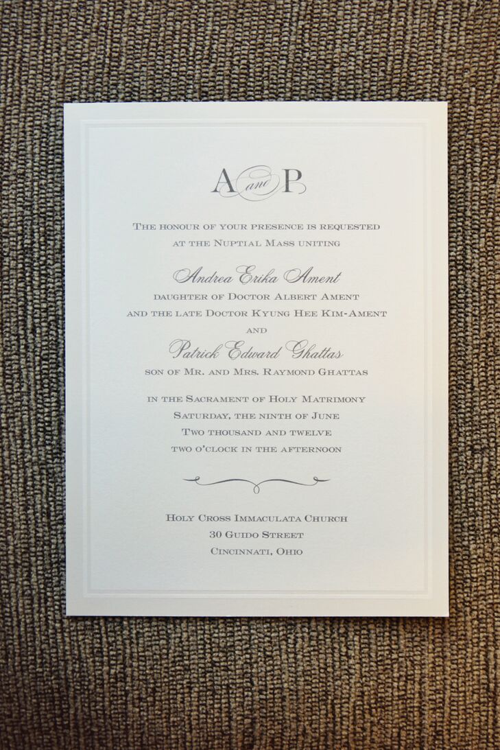 Ultra-traditional invitations featured black ink on crisp white card stock, with the couple's monogram up top.