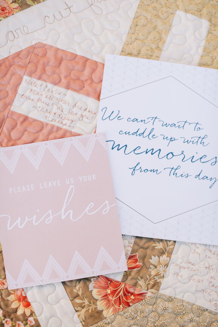 A quilt made by a friend took the place of a guest book, with guests writing messages on it.