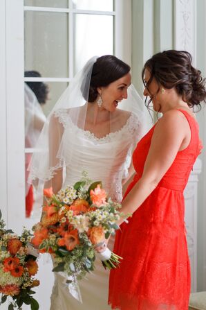 Bridesmaid in Bright Coral Dress