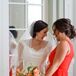 The bride wore a beautiful figure hugging Sophia Tolli gown with light lace details. It was simple and elegant for their chic garden setting.  Julia had one bridesmaid and gave her the colors (coral, peach and blush) and let her choose her own dress.