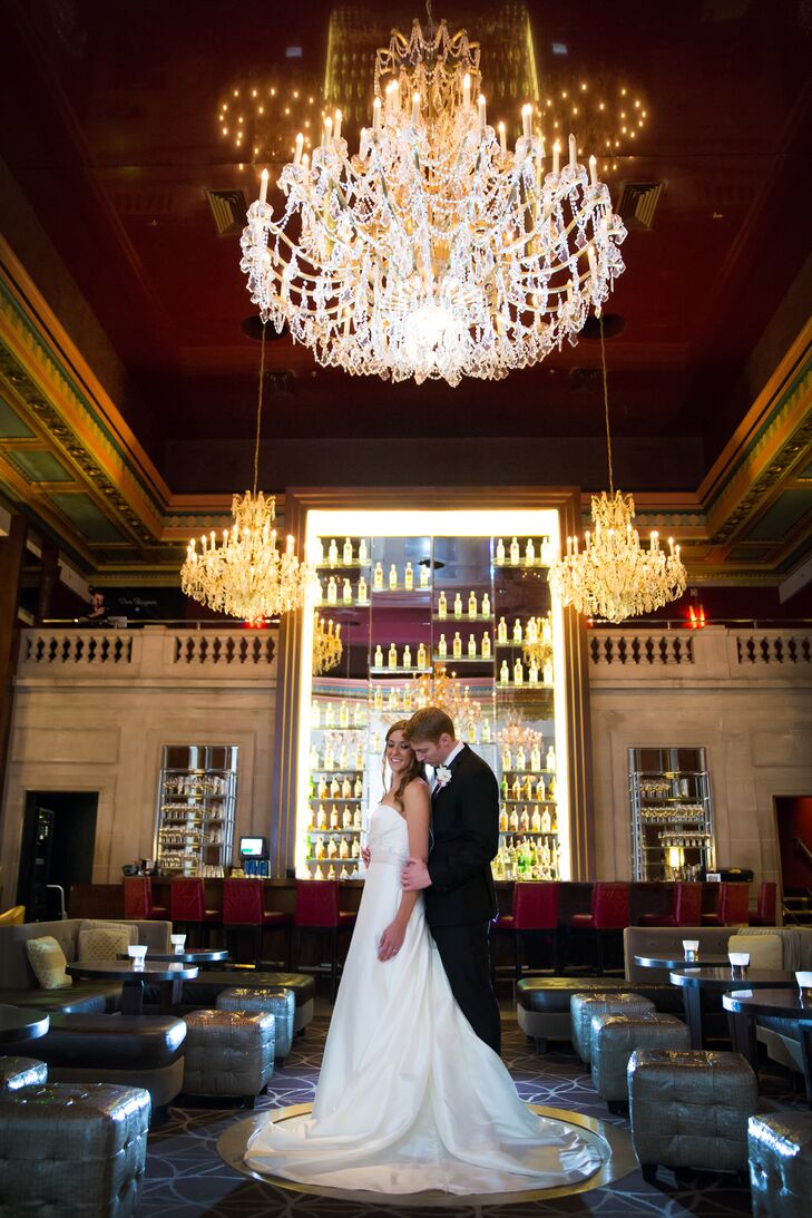 Andrea wore a white A-Line Casablanca wedding dress.