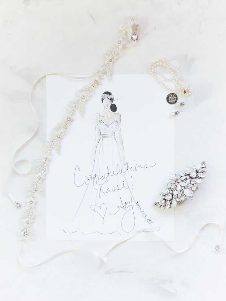 Kassi incorporated several family heirlooms into her look, including a double strand pearl bracelet, a pearl comb and a sash.