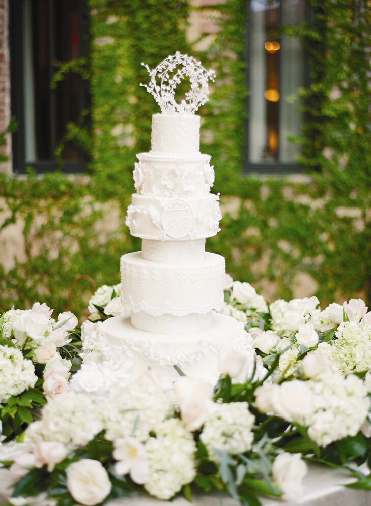 The elegant eight layer cake held a unique surprise inside -- instead of classic vanilla, Jessica and Ben chose a totally unexpected flavor for the cake, pineapple rum!