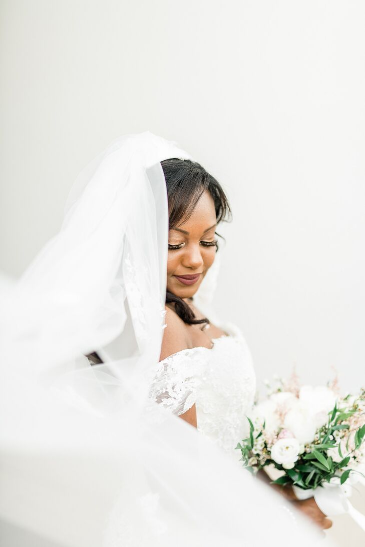 Bride With Off-the-Shoulder Wedding Dress and Veil for Italian Wedding