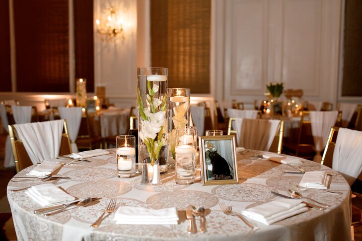 Centerpieces consisting of all-white orchids, roses, tulips, hydrangeas, gladiolus, peonies and white irises continued the elegant, modern aesthetic at the ballroom reception at Rosewood Crescent Hotel in Dallas, Texas.