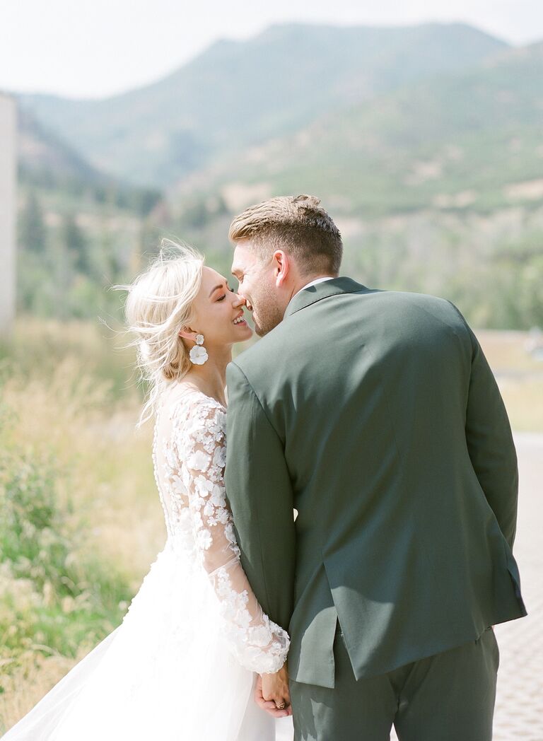 Couple shares first kiss outdoors at Utah wedding