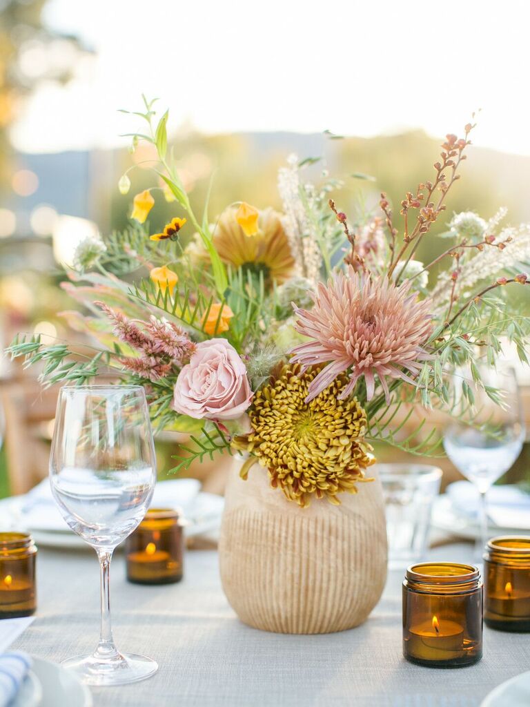 affordable fall wedding centerpiece with pink and yellow chrysanthemums in wooden vase