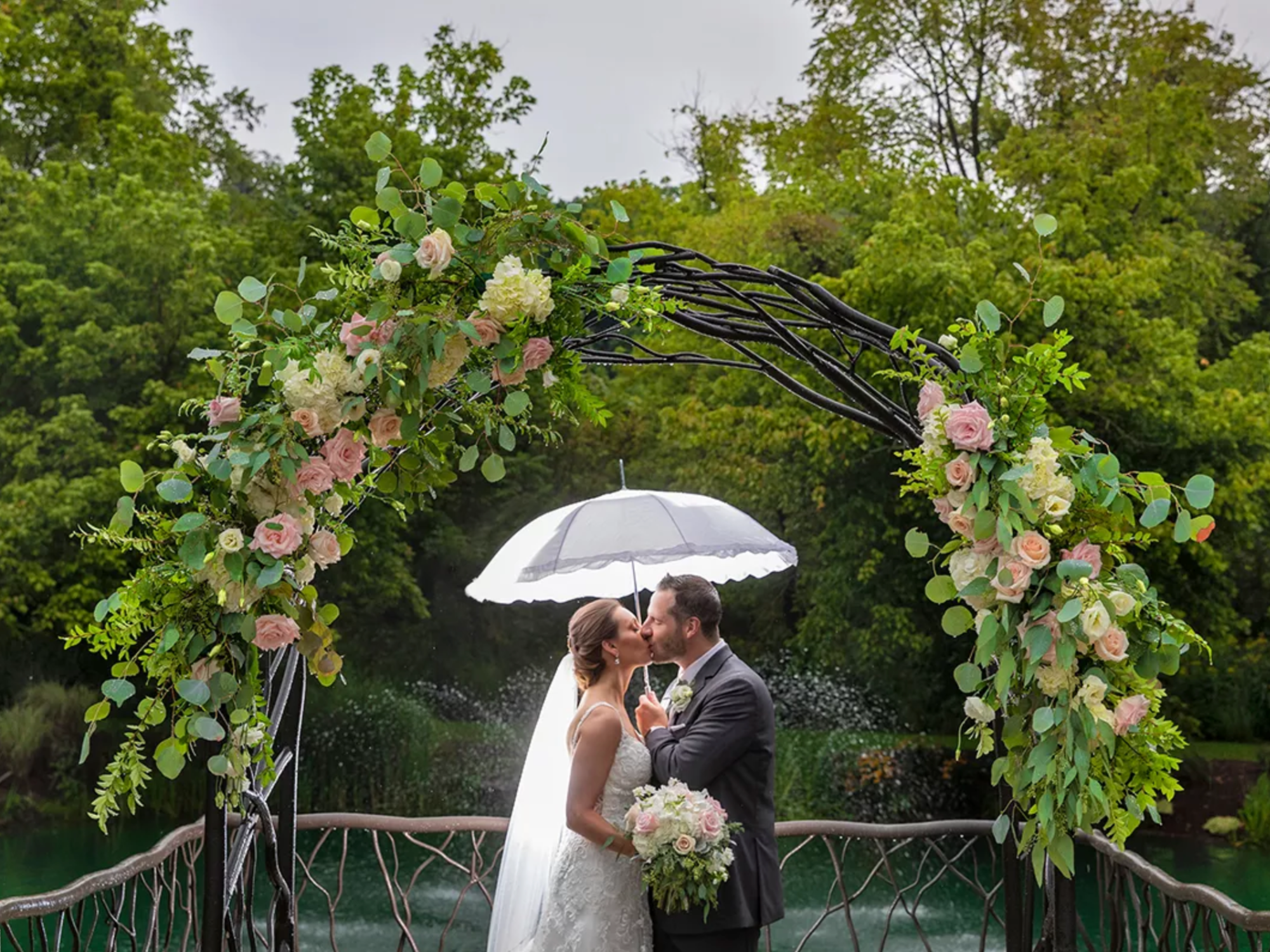 Couple kissing at waterfront Bella Sera Event Villa wedding venue in Pittsburgh