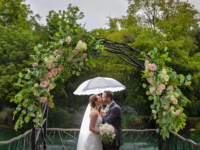 Couple kissing at waterfront Bella Sera Event Villa wedding venue in Pittsburgh
