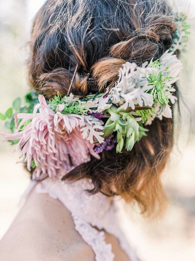 wedding hair flowers braided half up with oversize flowers