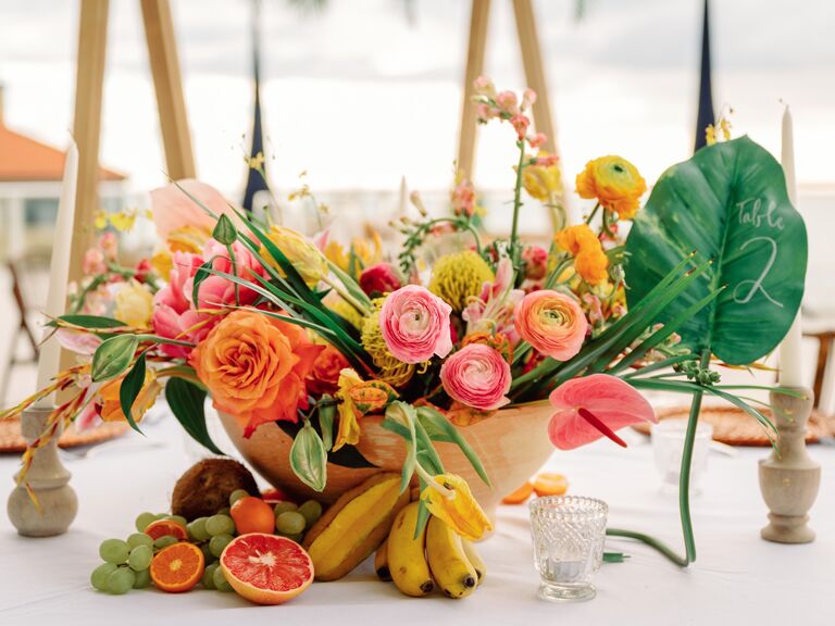 Tropical fruit flower wedding table arrangements
