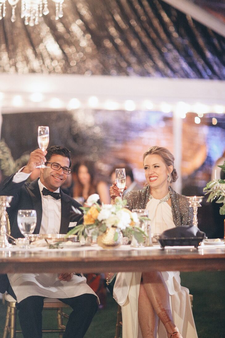 At the dance, the couple had shawls and flip-flops available for cold shoulders and tired feet. “The little details helped make our family and friends comfortable, and let them know how glad we were to have them with us on our big day.”