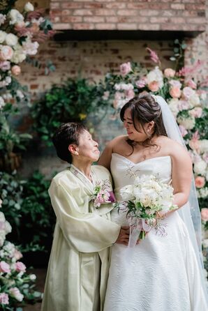 Bride With Family Member in Traditional Korean Hanbok With Lush Flowers