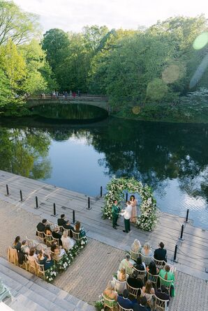 Intimate Boathouse Deck Ceremony With Lush Floral Arch, Lake at NYC Park