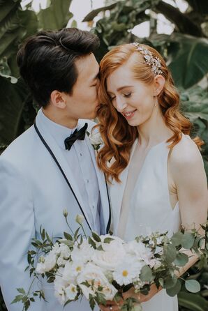 Bride and Groom in Sleek Wedding Attire
