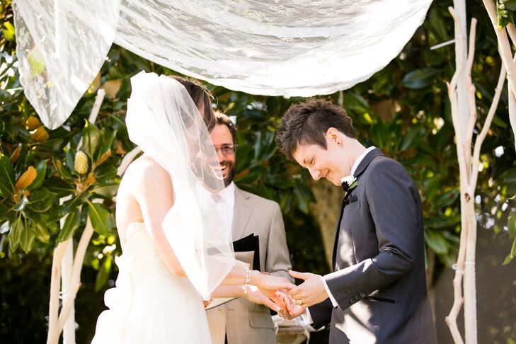 Caitlin wore a Rivini silk organza gown with a medium-length cage-style veil worn at the crown of her head.