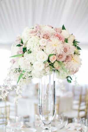 Elegant Floral Centerpieces With Tall Glass Vases