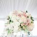 Elegant Floral Centerpieces With Tall Glass Vases