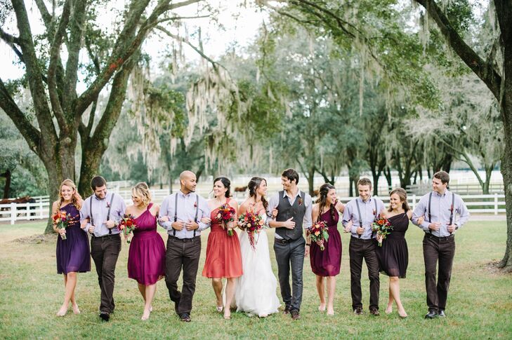 The groomsmen strutted down Lange Farm in a casual look that suited the outdoor setting. They wore blue J.Crew shirts, brown corduroy pants from the Gap and matching dark brown leather suspenders from BuyYourTies.com. Of course, they also wanted a little color to match the bridesmaids. So each man also accented his shirt with a red boutonniere.