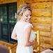"The first time I saw Claire Pettibone’s Kristene dress, I fell in love and knew that was going to be my wedding dress," the bride says. "It is the perfect combination of romantic, classic, simple and chic. I was able to customize it by having the back lowered, which was one of my favorite details of the dress. Instead of a veil I opted for a gorgeous full-flower crown, which I wore after the ceremony."