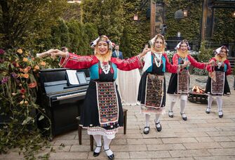 Greek wedding dancers in a line