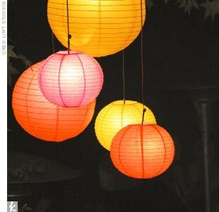 Asian decor elements, like illuminated red, pink, and orange Chinese lanterns, added a splash of color to the night sky.