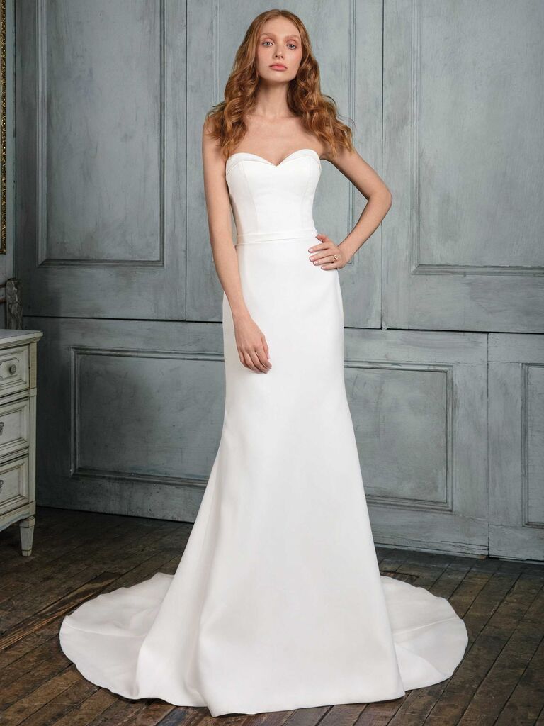 White strapless wedding dress by Justin Alexander. 